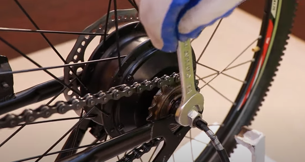 Attaching motorized wheel in bicycle should be properly aligned with brakes and cycling direction