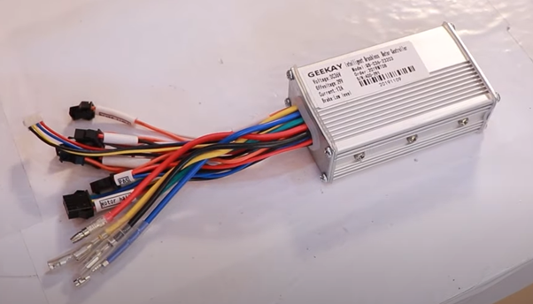 silver motor controller with complicated wire connections